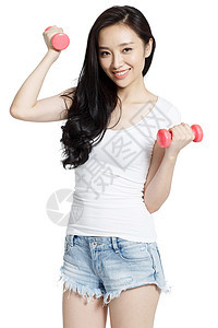 幸福仅一个人年轻女人拿着哑铃锻炼图片