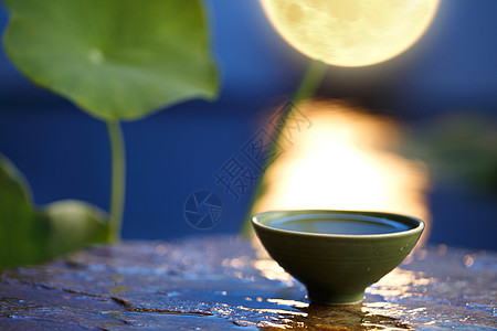 月饼茶和月亮中秋节月饼和月亮创意摆拍背景