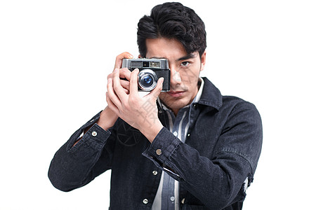 摄影肖像瞄准青年男人拿着照相机图片