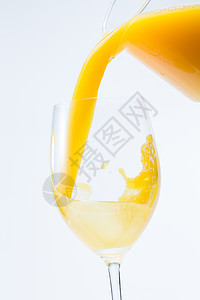 摄影膳食纤维落下橙汁图片