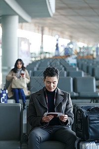 交通方式座位航空商务男女在候机大厅图片