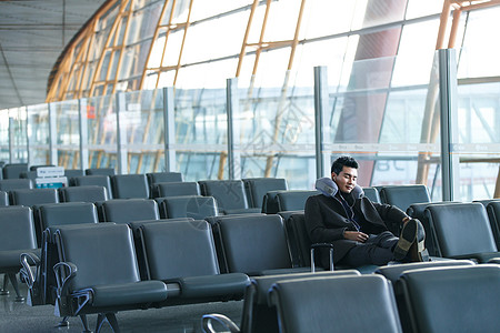 仅一个人椅子30岁到34岁商务男士在机场图片