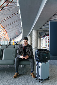 大半身亚洲人30岁到34岁商务男士在机场图片