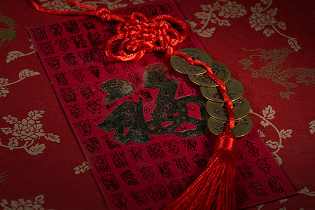 红底新年贺卡铜钱和红包背景