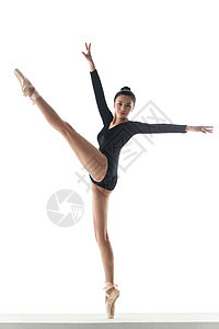 紧身连衣裤青年女人在跳芭蕾舞图片