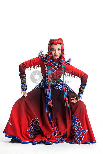 民族动态动作影棚拍摄穿着蒙古族服饰的女人图片