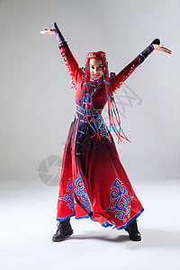 蒙古人舞蹈家装饰物穿着蒙古族服饰的女人图片
