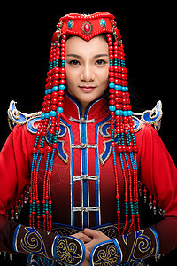 青年人东方人户内穿着蒙古族服饰的女人图片