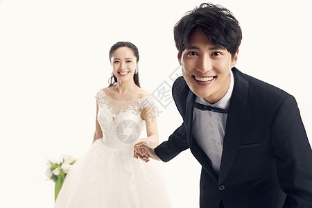 结婚礼服时尚浪漫的新郎和新娘背景