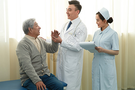 可靠保护工作服治疗医务工作者和患者在病房里背景图片