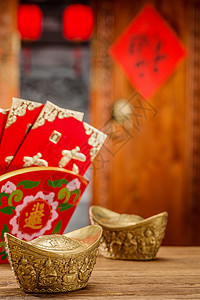 喜庆元素财神爷文化东亚金元宝和红包背景