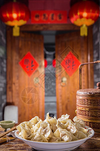 对联影棚拍摄东方春节吃饺子图片