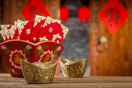 红包元素户内影棚拍摄传统金元宝和红包背景