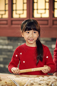 饮食温馨家园新年小女孩过年包饺子图片