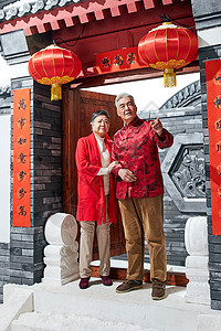 彩色图片传统服装寂寞老年夫妇过新年图片