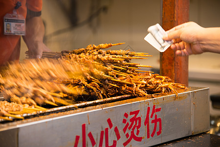 北京烤肉诱惑油炸食品餐馆北京王府井的小吃背景