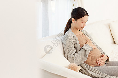 怀孕的妈妈居家休养的孕妈形象背景