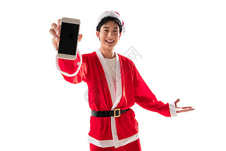 头饰节日欢乐穿圣诞服的青年男人拿着手机图片