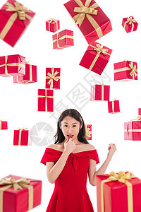 自信惊喜圣诞礼物漂亮的年轻女人与礼物图片