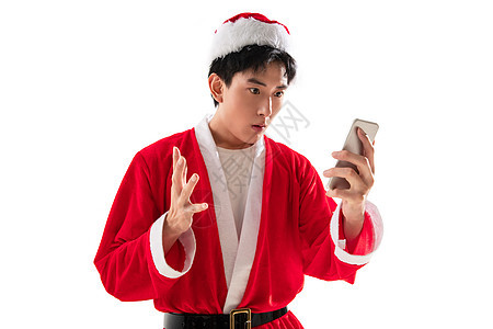 成年人20到24岁节日穿圣诞服的青年男人拿着手机图片