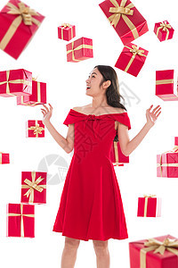 欢乐幸福圣诞礼物漂亮的年轻女人与礼物图片