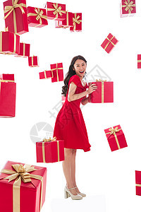 圣诞礼物礼品盒幸福漂亮的青年女人与礼物图片