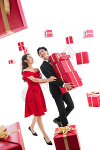 幸福女人套装快乐的青年伴侣抱着礼品盒图片