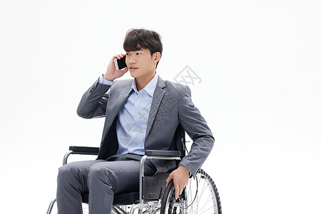 职业男性坐轮椅打电话图片
