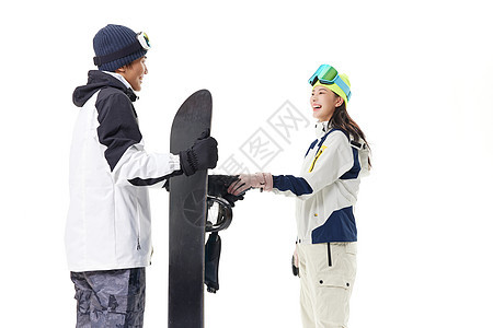 冬季滑雪男女交流对视图片