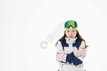 穿滑雪服感到寒冷的美女背景图片