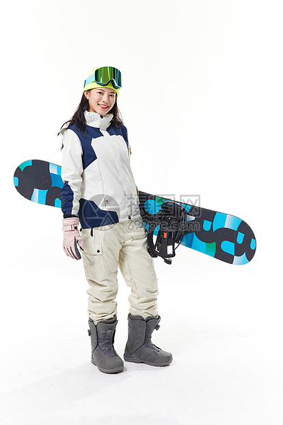 年轻美女单板滑雪图片