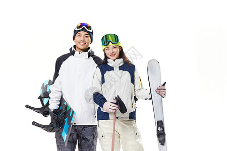 年轻情侣穿戴滑雪装备图片