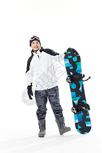 年轻男子手扶滑雪板图片