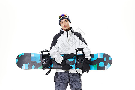 男青年拿着滑雪板背景图片
