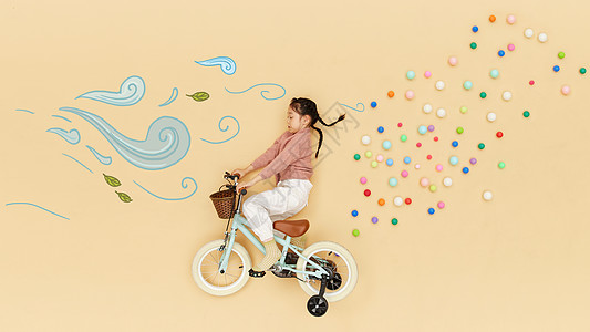 手绘儿童玩耍创意俯拍大风中骑自行车的小女孩背景