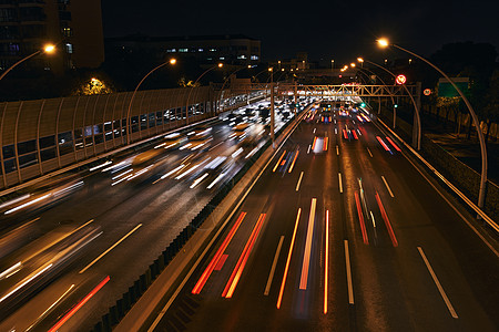 夜晚城市公路夜晚的城市车流背景