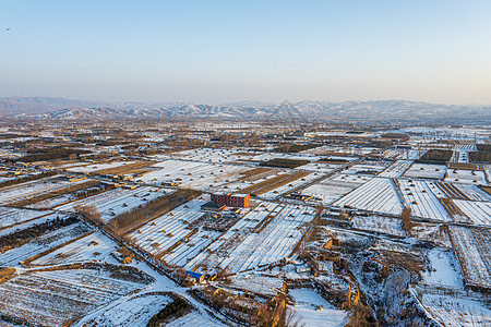 陕西靖边波浪谷冬日雪景航拍图片