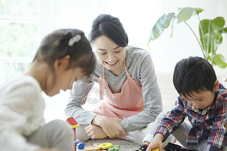 孩子哎女企业家微笑育儿保姆和孩子背景