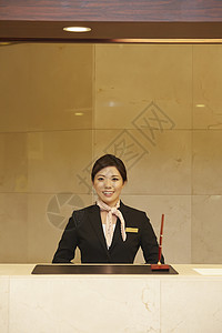 服务台职业妇女西装在酒店接待处工作的女人图片