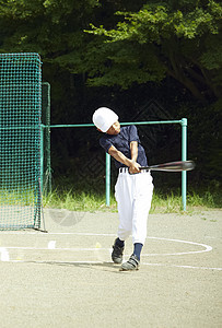 田地球赛清爽男孩棒球男孩实践的打击画象图片