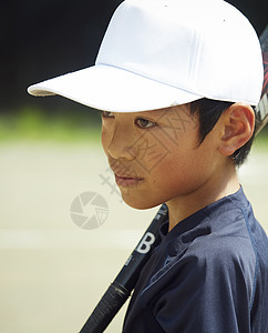 青少年棒球击球男男孩棒球男孩实践的打击画象图片