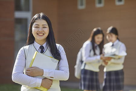 前视图背包秘书高中生学习书本图片