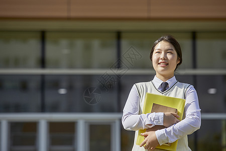 盯着看建筑大学生高中生学习书本图片