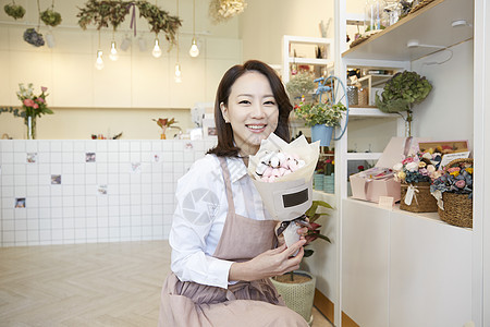 前视图花盆判断花店年轻女子韩国人图片