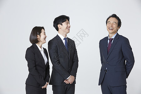三人商务团队形象交谈图片素材