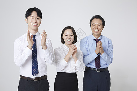 三人商务团队形象拍手图片素材