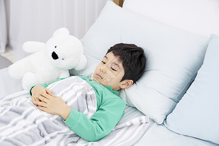 小男孩起床图片