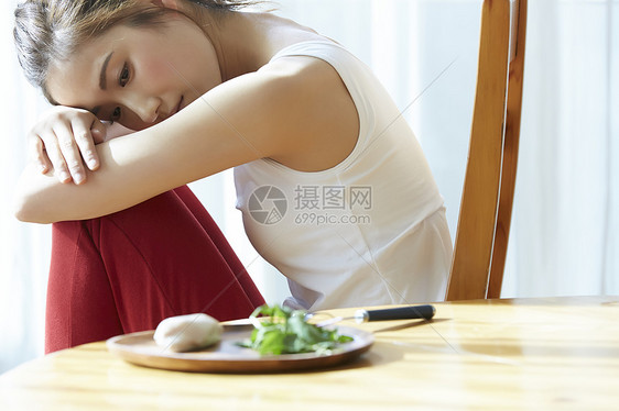 30多岁女人胃饮食忧郁图片