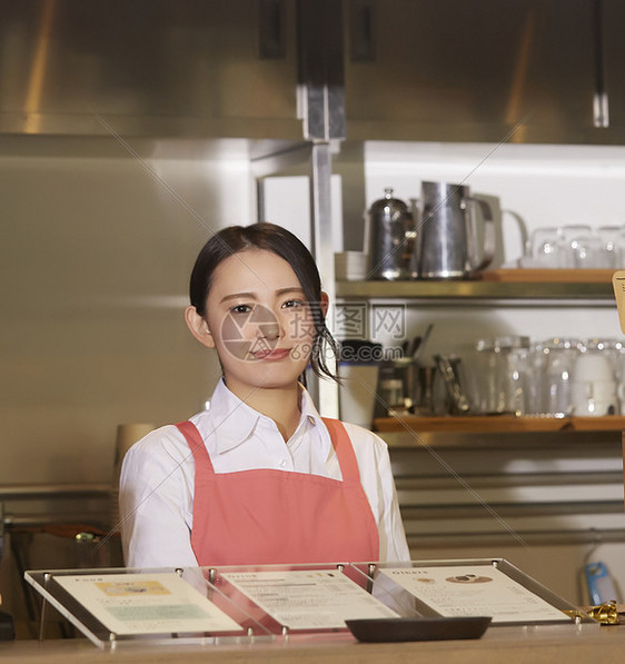 兼职工作商店切削工具在一家咖啡馆工作的妇女图片