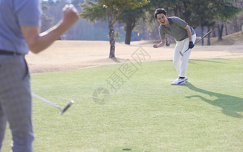 高尔夫球的人图片